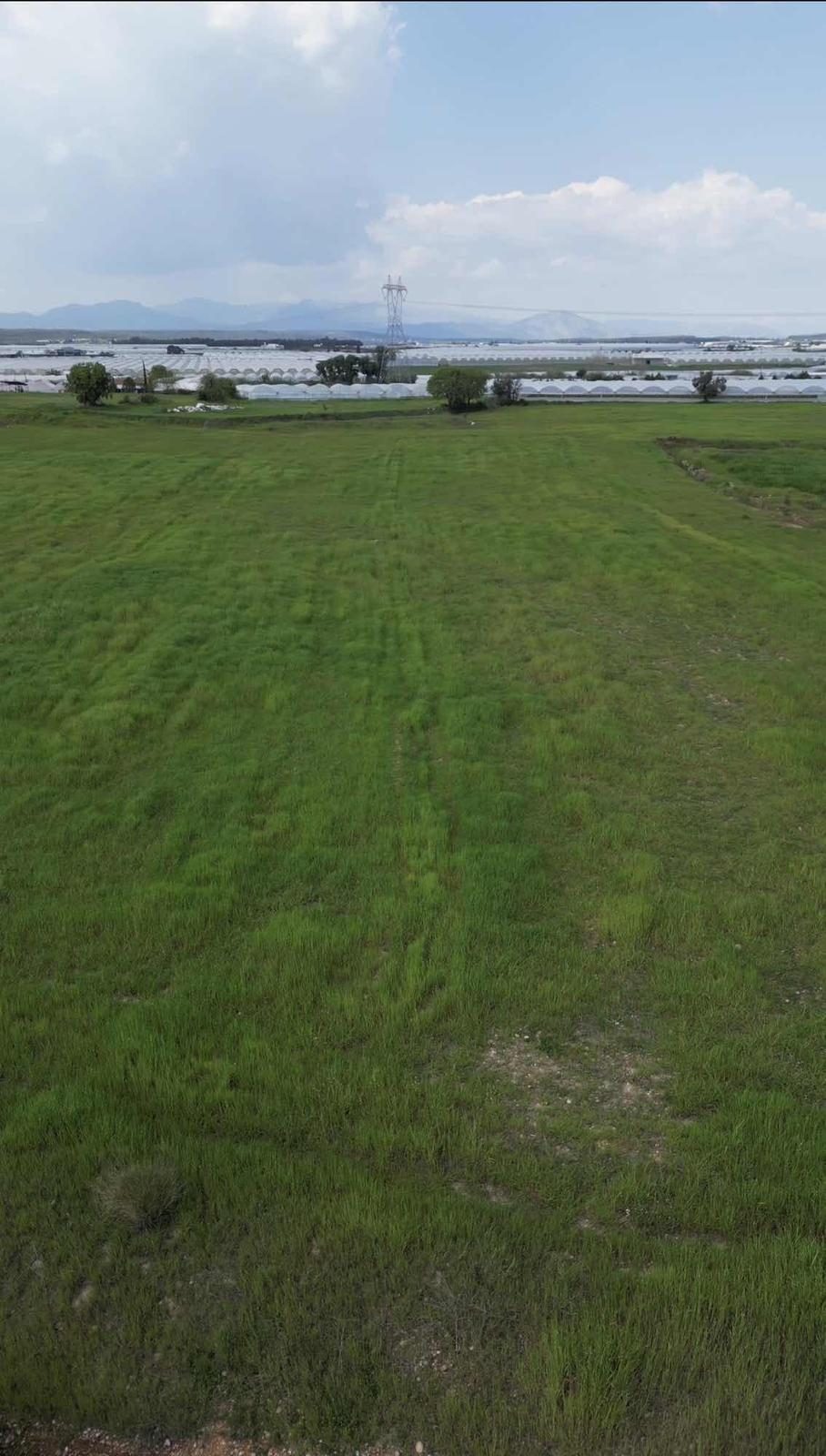 Aksu Kurşunluda 7.596 M² Yatırımlık Tarla