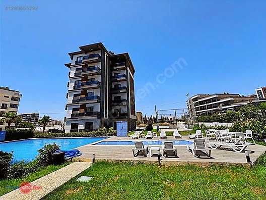 В АЛТЫНТАШЕ ЖИЛОЙ КОМПЛЕКС 1+1 С БАССЕЙНОМ И СПОРТИВНОЙ ПЛОЩАДКОЙ