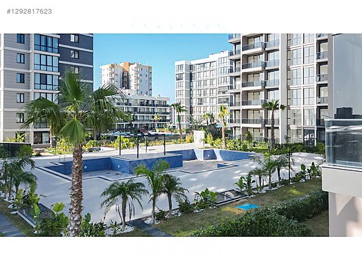 От СЕРГАТА ОЗГЮНЕРА СРЕДНИЙ ЭТАЖ КВАРТИРА 1+1 В ПРЕСТИЖНОМ КОМПЛЕКСЕ