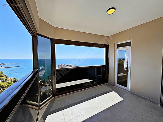 GÜZELOBA MİMAR YAPIMI PANORAMİK DENİZ MANZARALI ARAKAT 3+1 DAİRE