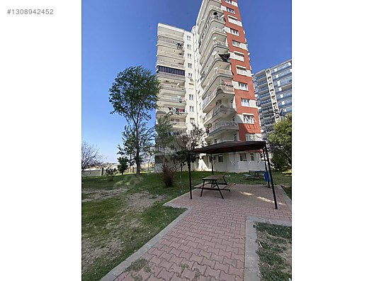 В Алтынташе внутри жилого комплекса продается 3+1 квартира на первом этаже с садом