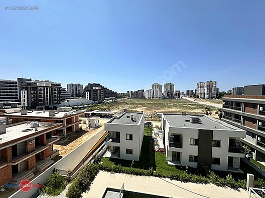 Altıntaş'ta İSKANLI, havuzlu site içinde satılık daire.