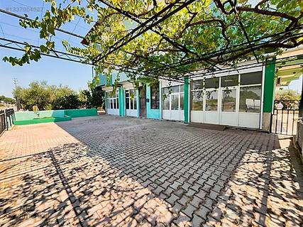 В Мендересе угловой склад/магазин нулевой постройки с Сертификатом регистрации здания на Анайоле