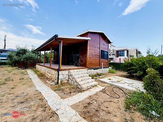 Düzlerçami satılık arsa(içinde ev bulunmaktar)elk. su. aboneli